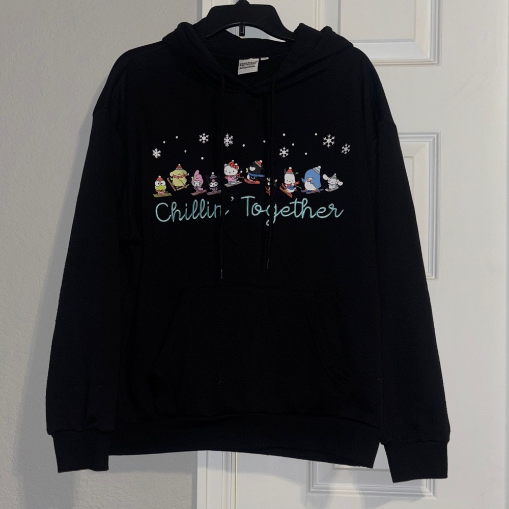 Hello Kitty & Friends Aeropostale.    Black Hoodie with Pastel Winter Characters